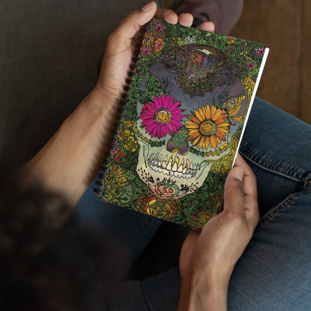 Skull by Lauri Kaye | Spiral notebook