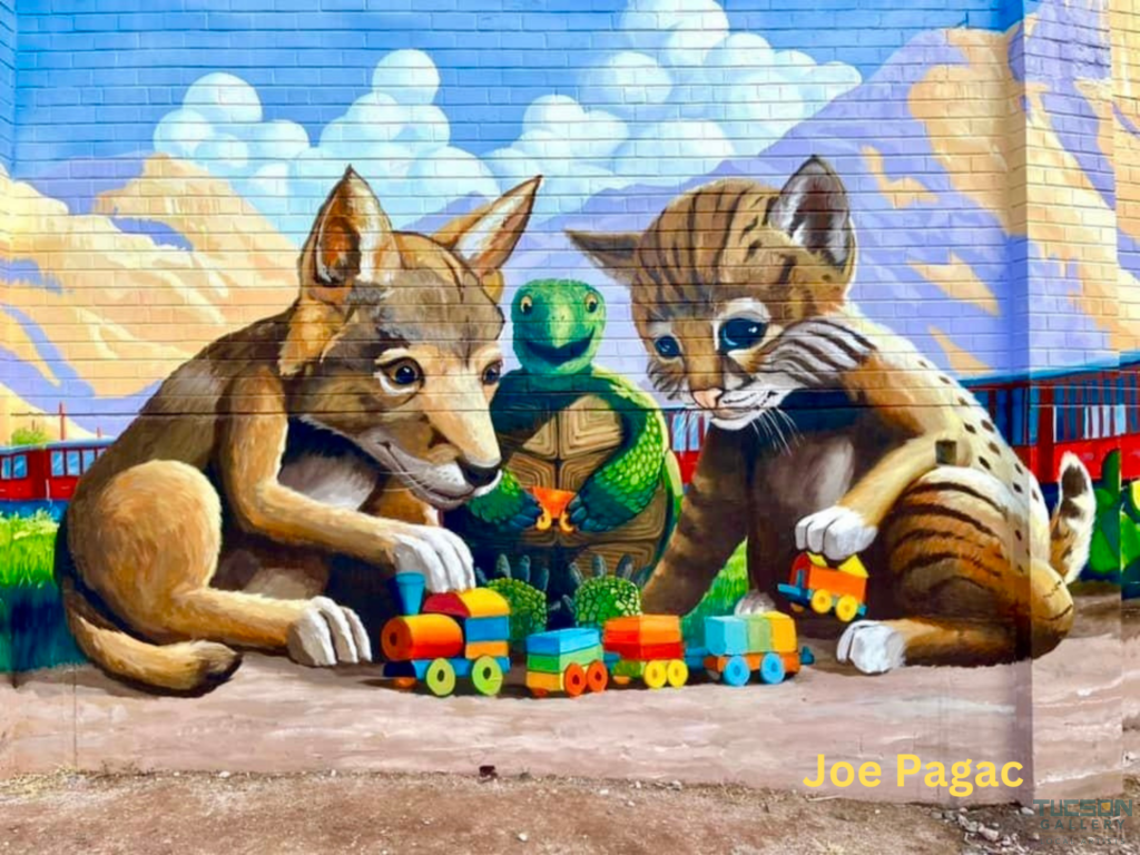 A colorful mural by Joe Pagac at Tucson Gallery, depicting a baby bobcat and a coyote surrounded by artistic elements.