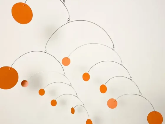 Orange Calder-style mobile from Tucson Gallery, a striking AZ art gift and souvenir.