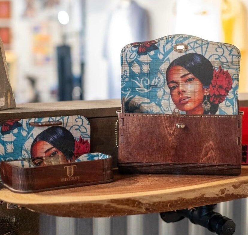 TimberTote wooden purse with curved living-hinge design and artist-printed lining