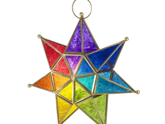 Rainbow seven-point star tealight lantern with textured rainbow panels in a gold-tone metal frame, hanging on a chain